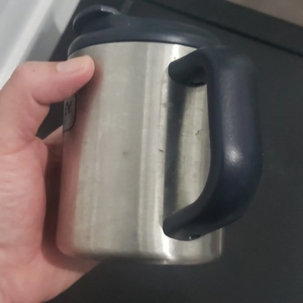 12 ounce‎ Stanley brand metal coffee cup with screw on lid